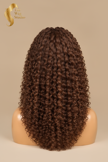 Back view of The Wig Studio™ rich brown curly human hair wig